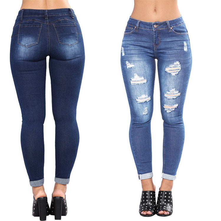 Denim broek met gescheurde gaten